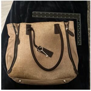 Amber Rose leather and real fur bag